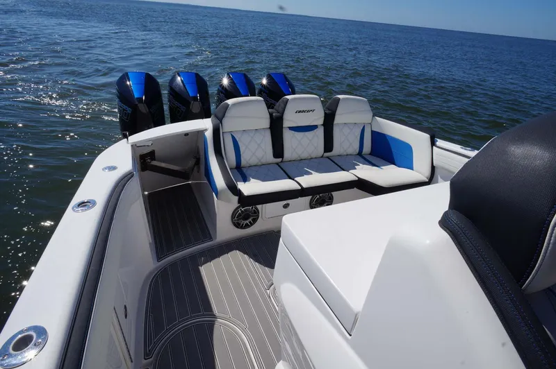 Slide: The Image of 2020 Concept 44' Cuddy Cabin boat with luxurious seating and powerful engines on open water. - 24