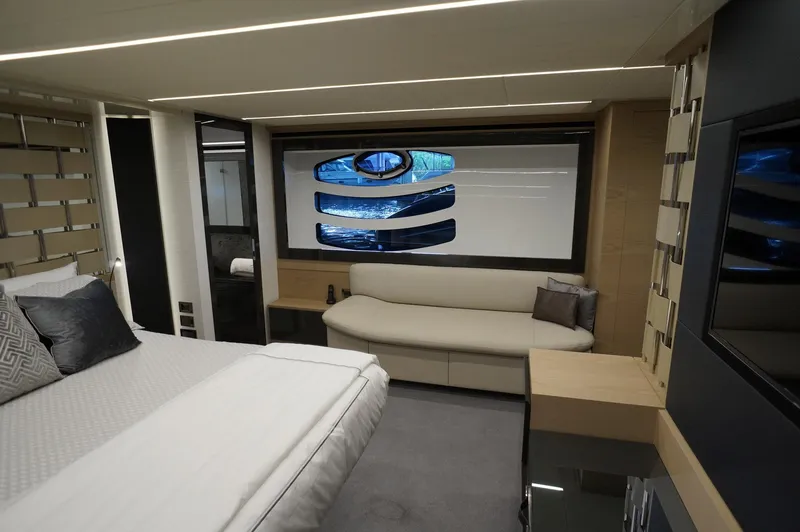 Slide: The Image of Luxurious interior of a 2016 Pershing 70 yacht with modern furnishings and elegant design. - 12