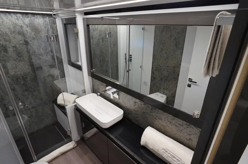 Slide: The Image of Luxurious bathroom interior of 2016 Pershing 70 yacht with modern fixtures and elegant design. - 15