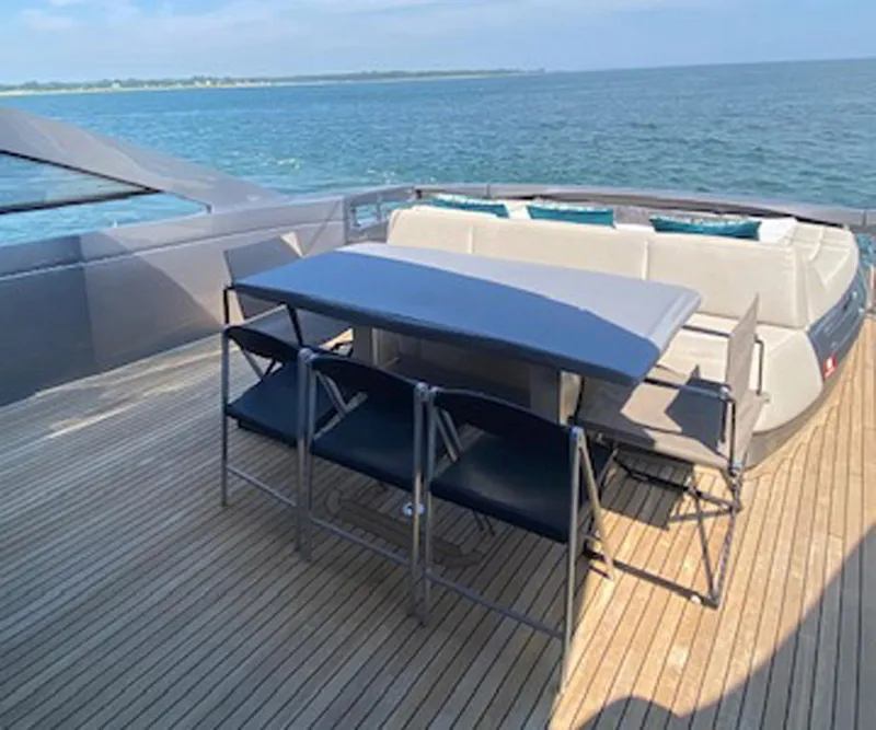 Slide: The Image of Luxury deck seating on 2016 Pershing 70 yacht with ocean view. - 29