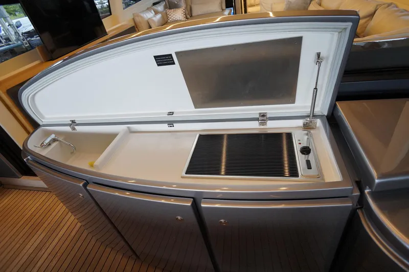 Slide: The Image of Luxury yacht Pershing 70 (2016) onboard kitchenette with sink and grill. - 5