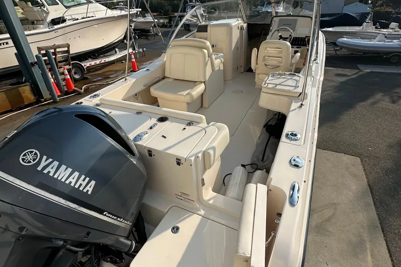 Slide: The Image of 2017 Grady White 235 boat with Yamaha engine, docked and ready for use. - 5
