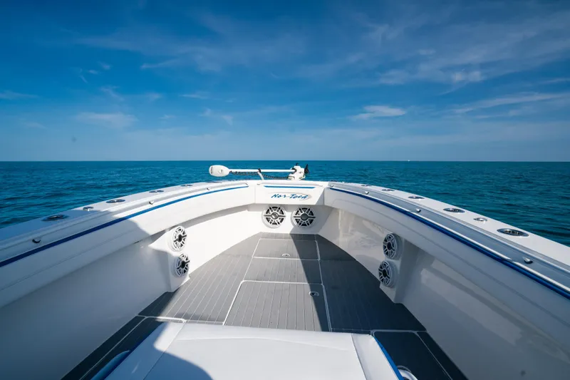 Slide: The Image of 2022 Nor-Tech 392 Super Fish boat on open sea under clear blue sky. - 10