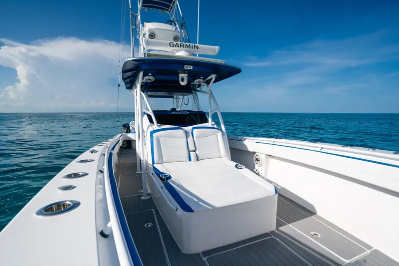 Slide: The Image of 2022 Nor-Tech 392 Super Fish boat on open sea under clear blue sky. - 13