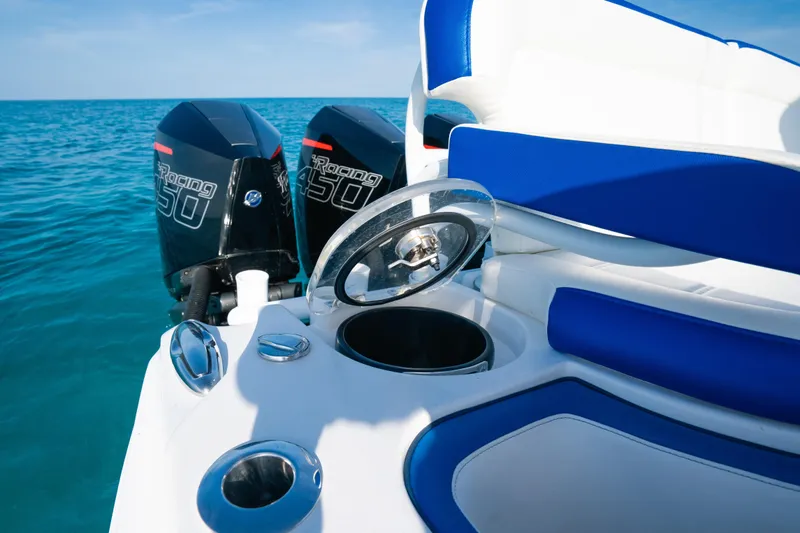 Slide: The Image of 2022 Nor-Tech 392 Super Fish boat with dual 450 Racing engines on blue ocean. - 25