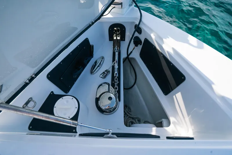 Slide: The Image of Anchor compartment of 2022 Nor-Tech 392 Super Fish boat with visible chain and equipment. - 37