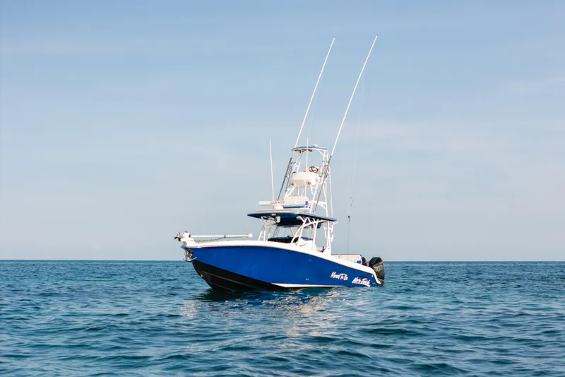 Slide: The Image of 2022 Nor-Tech 392 Super Fish boat on calm ocean waters. - 39