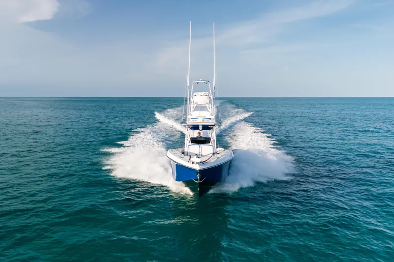 Slide: The Image of 2022 Nor-Tech 392 Super Fish cruising on open ocean waters. - 49