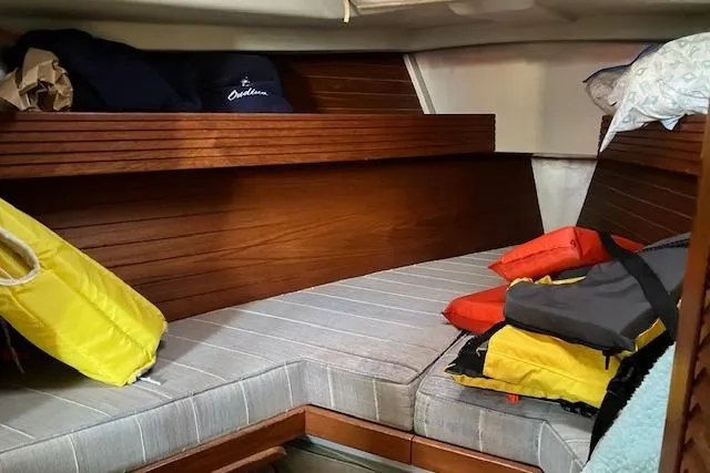 Slide: The Image of Interior of 1990 C&C 30-2 sailboat with cushions and life jackets. - 27