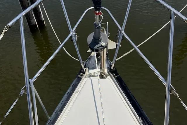 Slide: The Image of Bow of 1990 C&C 30-2 sailboat with stainless steel railings. - 5
