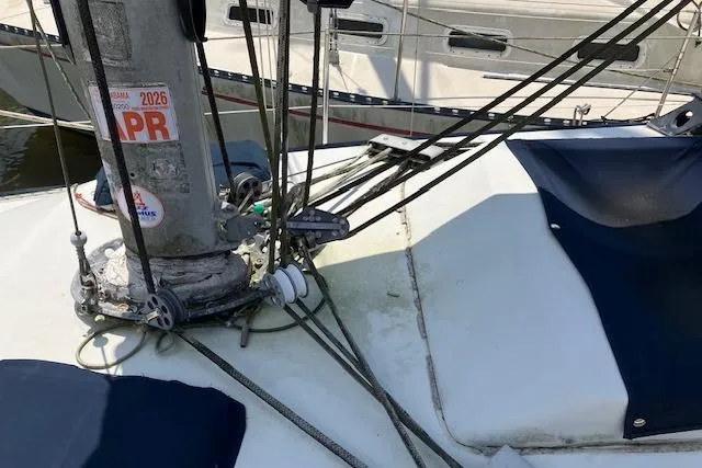 Slide: The Image of 1990 C&C 30-2 sailboat deck with rigging and mast details. - 9