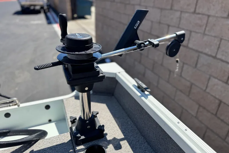 Slide: The Image of 2020 Alumacraft Escape 165 SC boat with mounted fishing rod holder. - 17