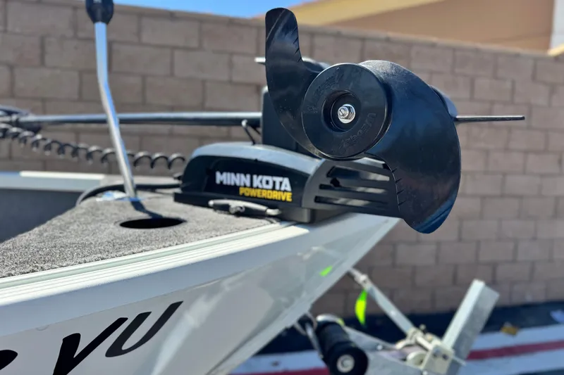 Slide: The Image of 2020 Alumacraft Escape 165 SC with Minn Kota PowerDrive trolling motor. - 8