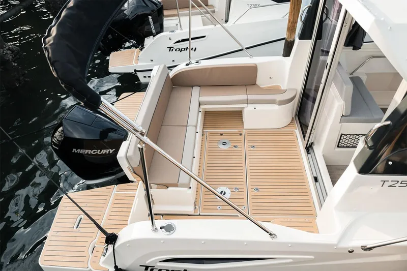 Slide: The Image of Manufacturer Provided Image: 2025 Bayliner Trophy T25 Explorer boat with Mercury engine, featuring spacious deck and seating. - 4
