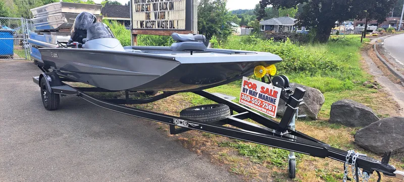 Slide: The Image of 2025 Excel 1860 Stalker SC boat for sale on trailer, outdoor setting. - 1
