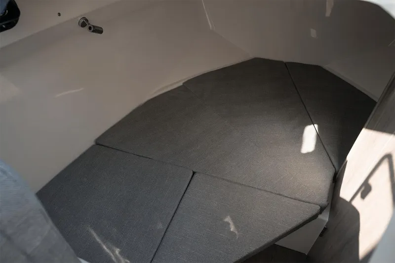 Slide: The Image of Manufacturer Provided Image: 2025 Bayliner Trophy T25 Pilothouse interior cabin with cushioned seating. - 9