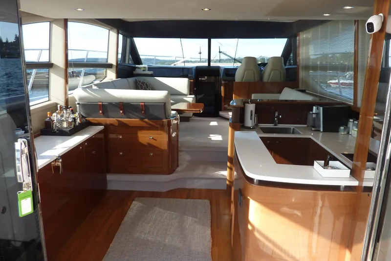 Slide: The Image of Luxurious interior of 2017 Princess 52 yacht with modern kitchen and seating area. - 10