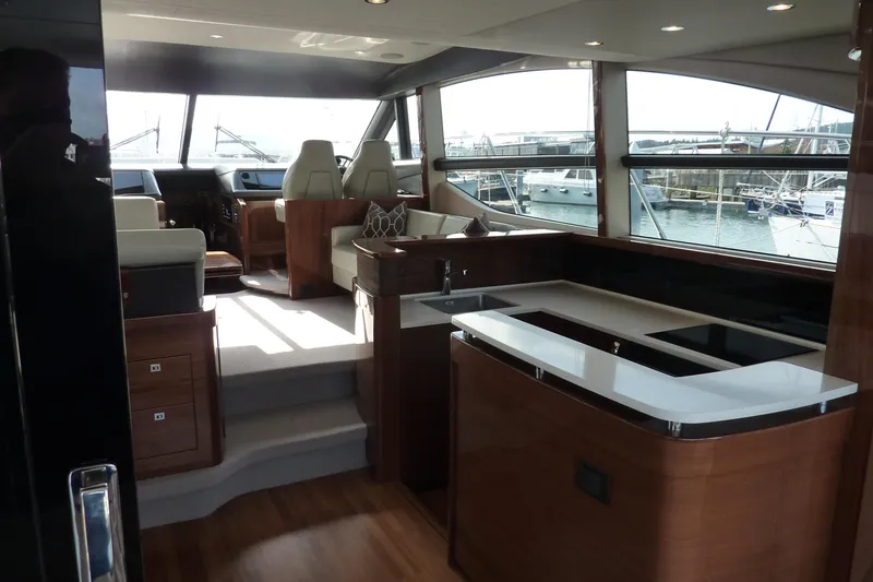Slide: The Image of Luxurious interior of 2017 Princess 52 yacht with modern furnishings and panoramic windows. - 13