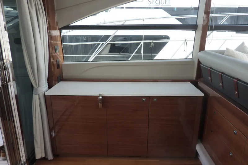 Slide: The Image of Luxurious interior of 2017 Princess 52 yacht with sleek wooden cabinetry. - 18