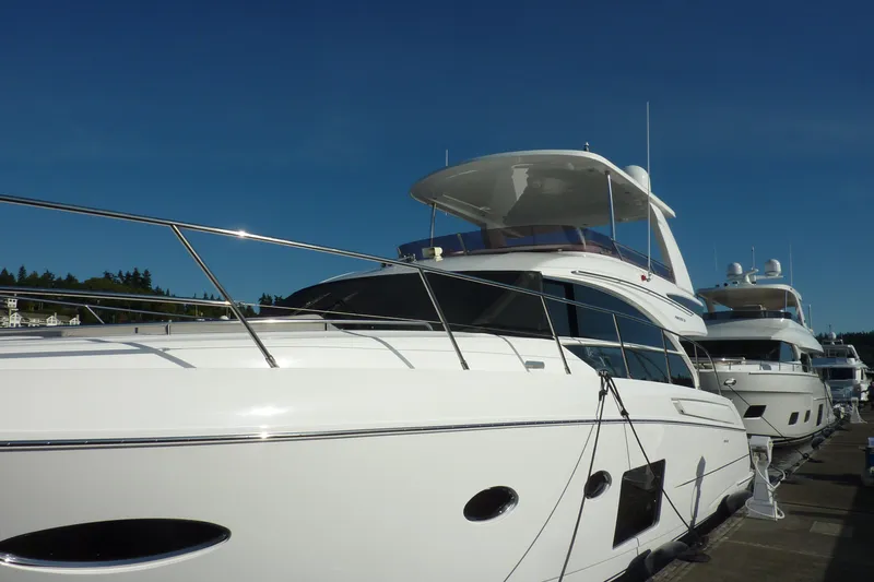 Slide: The Image of Luxurious 2017 Princess 52 yacht docked under clear blue sky. - 2