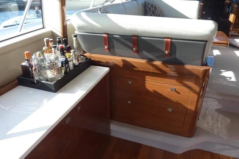 Slide: The Image of Luxurious interior of 2017 Princess 52 yacht with bar setup and elegant seating. - 20