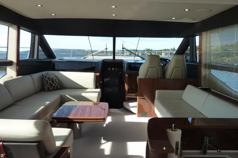 Slide: The Image of Luxurious interior of a 2017 Princess 52 yacht with elegant seating and panoramic windows. - 23