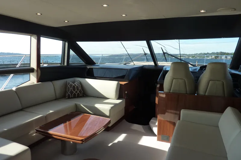 Slide: The Image of Luxurious interior of a 2017 Princess 52 yacht with elegant seating and panoramic windows. - 28
