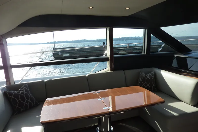 Slide: The Image of Luxurious interior of 2017 Princess 52 yacht with waterfront view and elegant seating area. - 29
