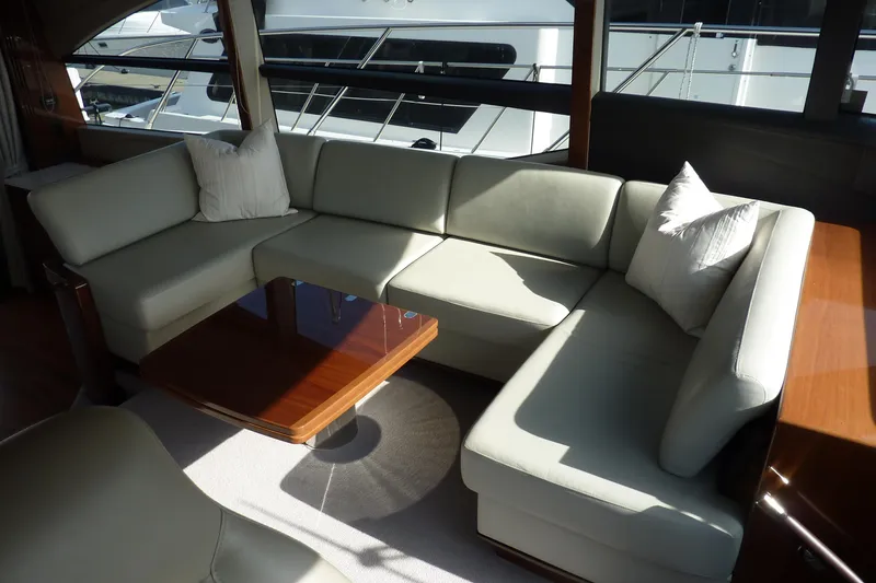 Slide: The Image of Luxurious interior of 2017 Princess 52 yacht with elegant seating and table. - 32