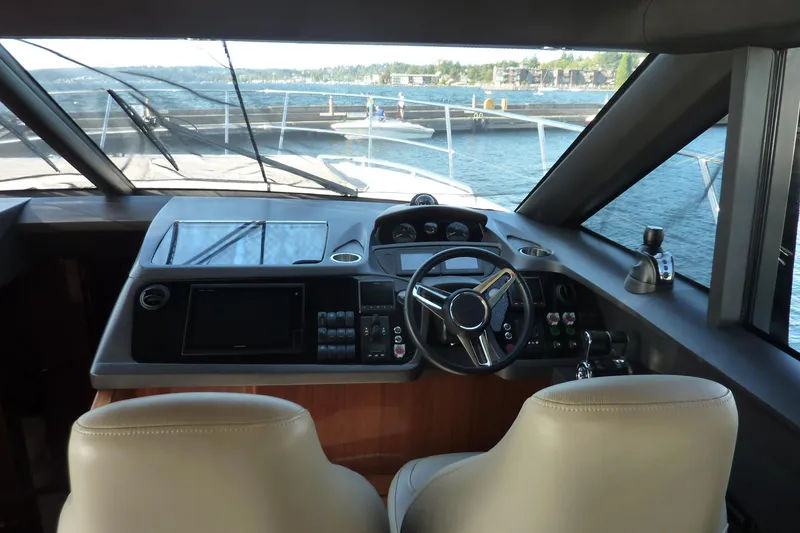 Slide: The Image of Interior helm of 2017 Princess 52 yacht with modern controls and dual seats. - 33