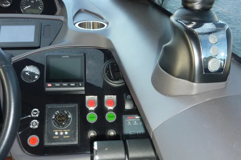 Slide: The Image of Control panel of a 2017 Princess 52 yacht with various buttons and displays. - 39