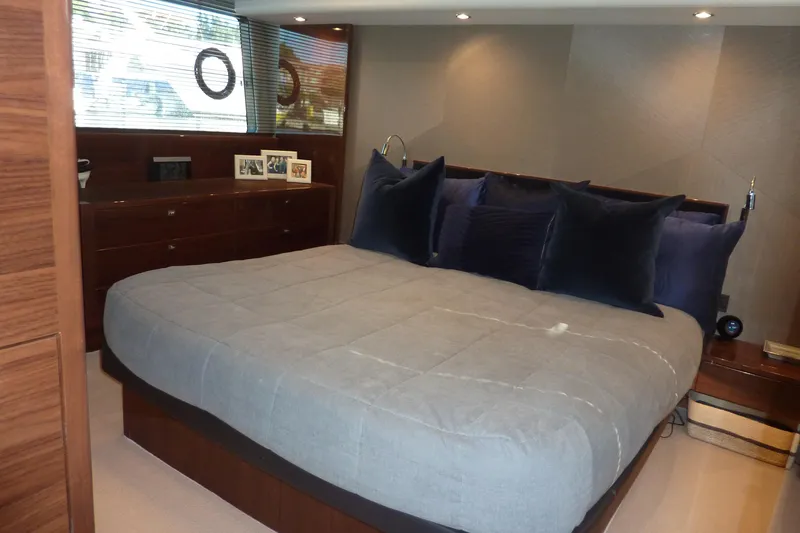 Slide: The Image of Luxurious bedroom interior on a 2017 Princess 52 yacht, featuring elegant bedding and decor. - 42
