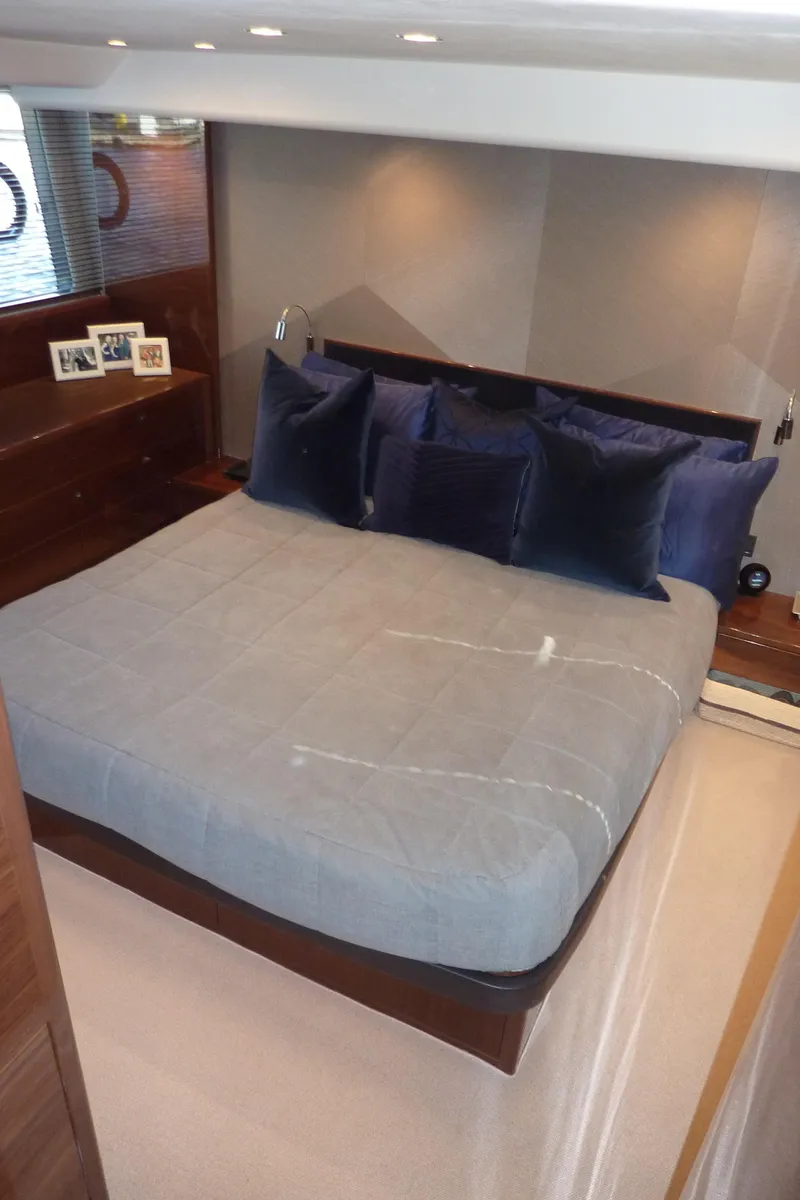 Slide: The Image of Luxurious bedroom interior of 2017 Princess 52 yacht with elegant bedding and decor. - 47
