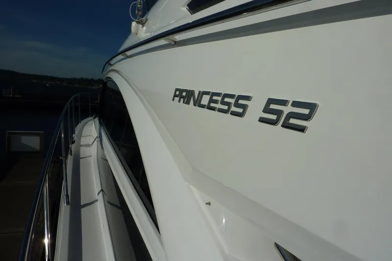 Slide: The Image of 2017 Princess 52 yacht side view with logo in focus. - 6