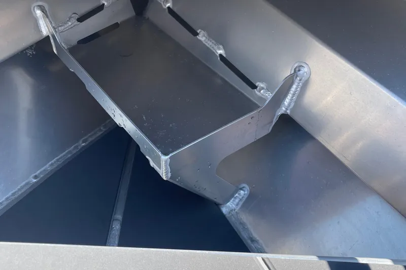 Slide: The Image of Close-up of 2024 Stabicraft 1450 Frontier's metal interior structure and welds. - 12