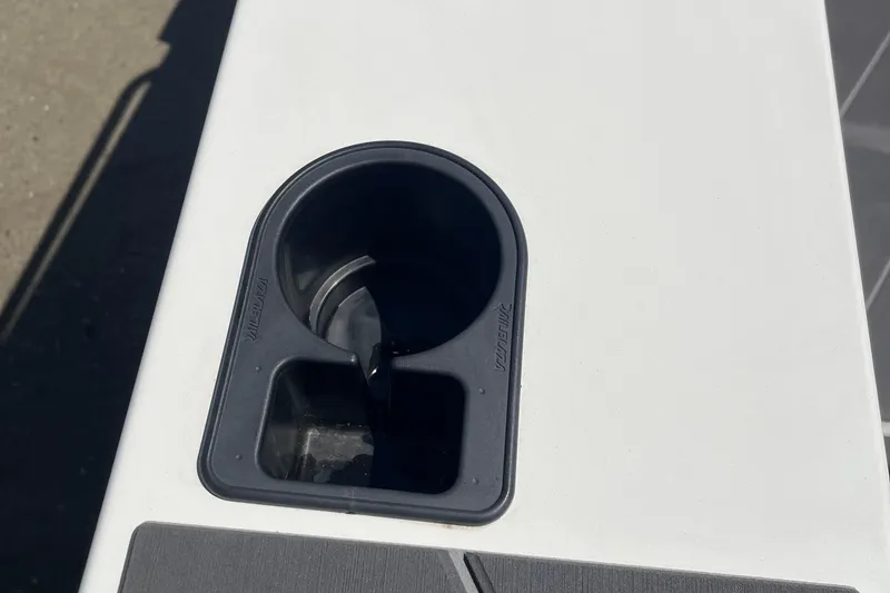 Slide: The Image of Cup holder on 2024 Stabicraft 1450 Frontier boat, featuring a sleek design. - 14