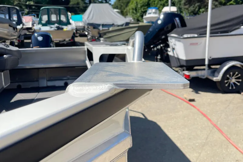 Slide: The Image of 2024 Stabicraft 1450 Frontier boat detail, showcasing aluminum construction in a marina setting. - 16