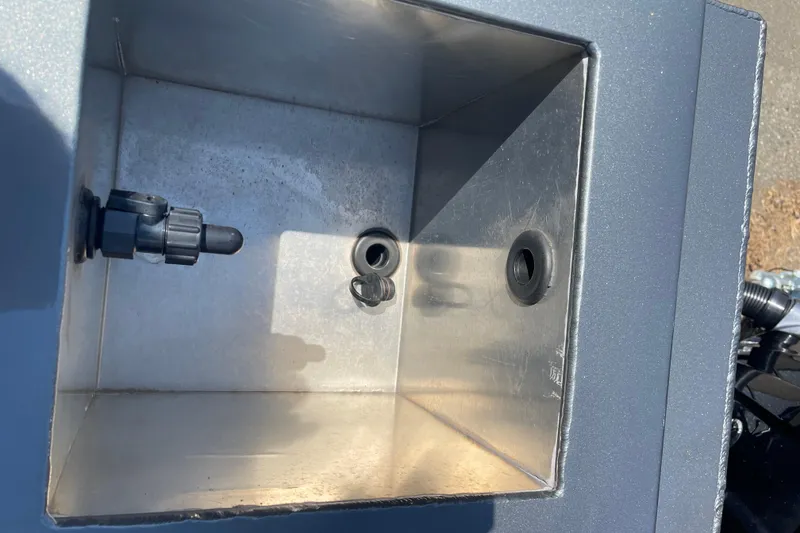 Slide: The Image of Interior view of Excel Buoy 10, 2025 model, featuring a metal compartment with fittings. - 10