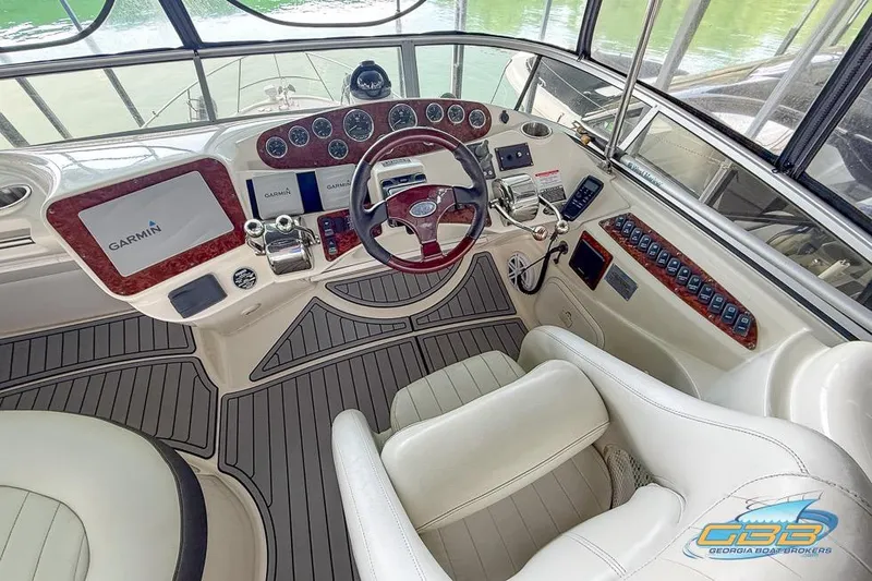Slide: The Image of 2007 Meridian 341 Sedan helm with Garmin navigation, luxurious seating, and modern controls. - 13