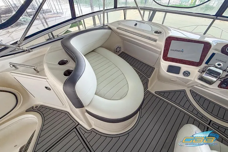 Slide: The Image of 2007 Meridian 341 Sedan cockpit with Garmin navigation, plush seating, and modern design. - 15