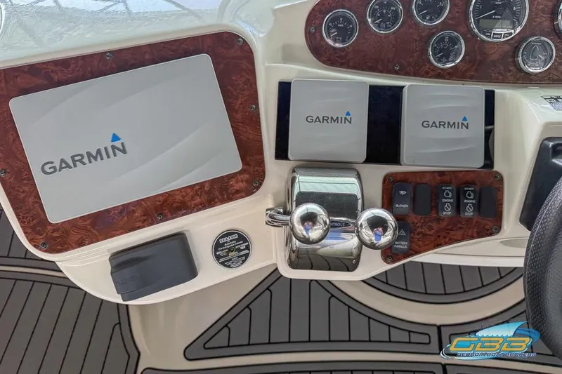 Slide: The Image of 2007 Meridian 341 Sedan dashboard with Garmin navigation and control panels. - 16