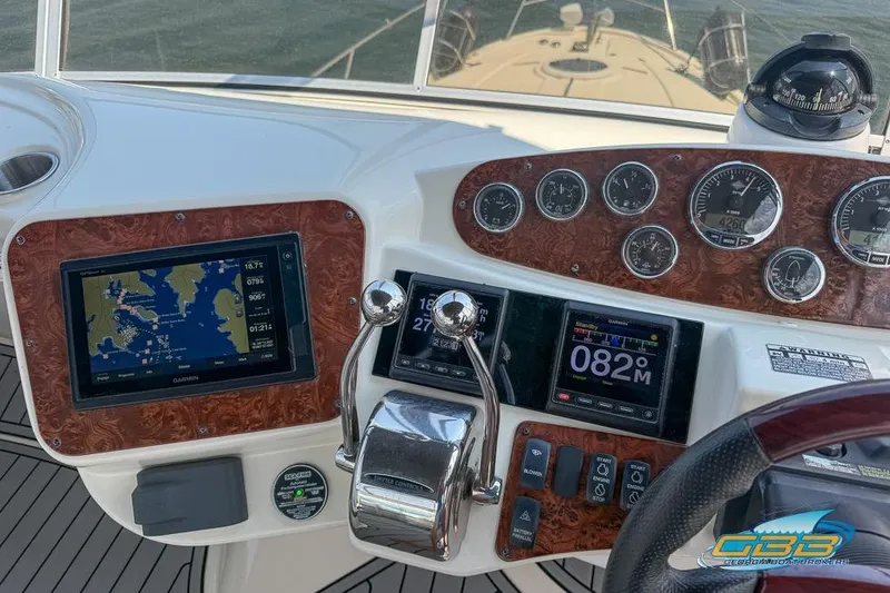 Slide: The Image of 2007 Meridian 341 Sedan dashboard with navigation and control instruments. - 17