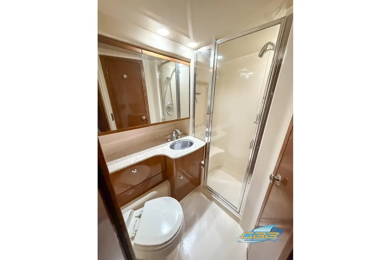 Slide: The Image of 2007 Meridian 341 Sedan bathroom with shower, sink, and toilet in compact design. - 26