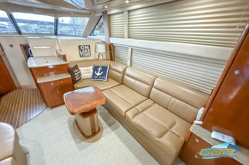 Slide: The Image of Luxurious interior of 2007 Meridian 341 Sedan yacht with leather seating and nautical decor. - 30