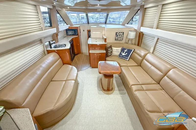Slide: The Image of Luxurious interior of a 2007 Meridian 341 Sedan yacht with plush seating and modern amenities. - 31
