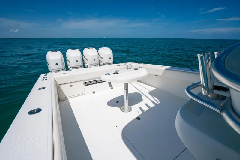 Slide: The Image of 2006 Venture 39 Open boat with four outboard engines on open sea. - 15