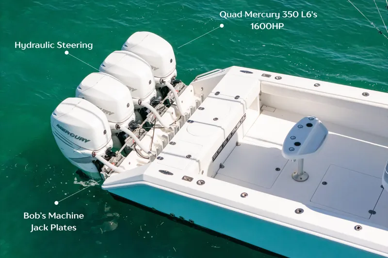 Slide: The Image of 2006 Venture 39 Open boat with quad Mercury 350 engines, hydraulic steering, and jack plates. - 2