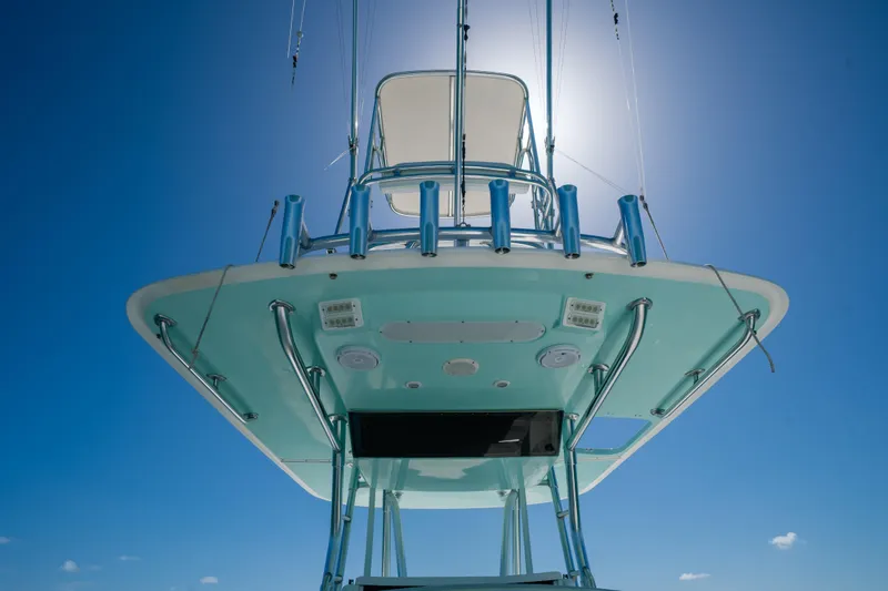 Slide: The Image of 2006 Venture 39 Open boat viewed from below against clear blue sky. - 27