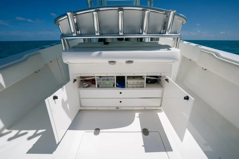 Slide: The Image of 2006 Venture 39 Open boat interior with open storage compartments, ocean view. - 29