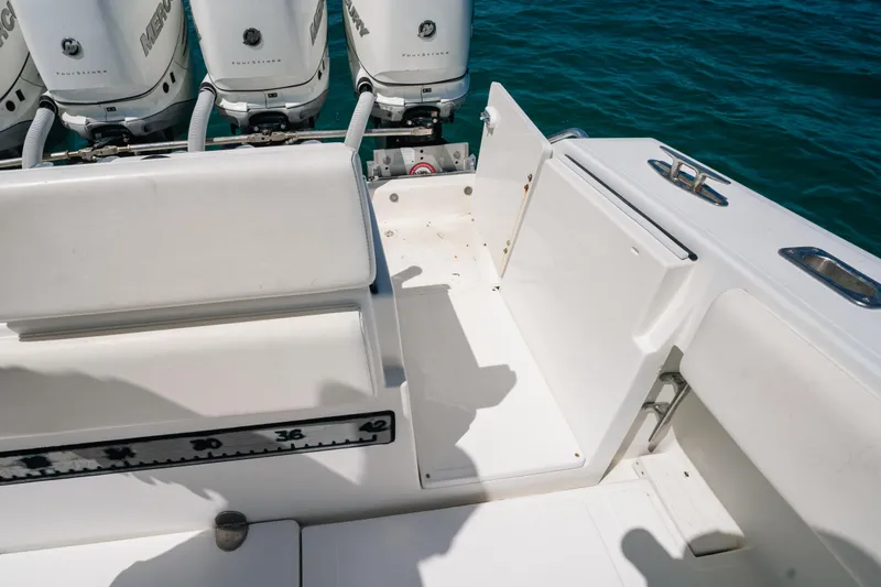 Slide: The Image of 2006 Venture 39 Open boat deck with Mercury outboard engines. - 32